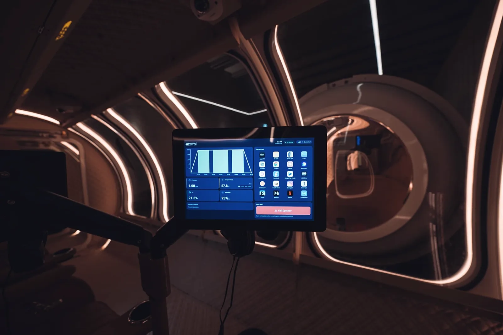 Operator control tablet in front of a chamber porthole